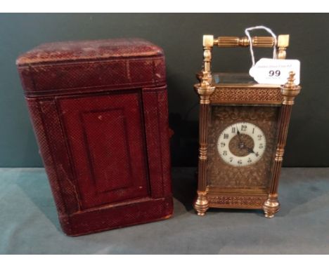 A late 19th century French gilt brass carriage clock, having twin barrel, coil gong striking movement, five bevelled edge gla