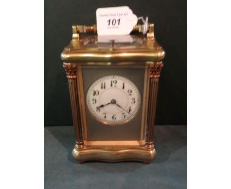 A late 19th century/early 20th century French gilt brass carriage clock, having twin barrel repeating gong striking movement,