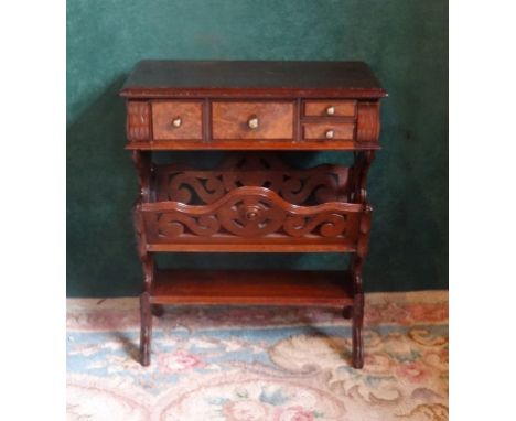 A reproduction mahogany and walnut side table with four drawers over magazine rack and single shelf (61cm wide).