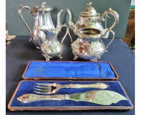 A Victorian three piece silver plated tea set, comprising: teapot, twin handled sugar bowl and milk jug, together with a furt