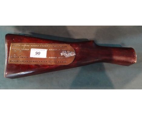 A 303 Enfield rifle butt, with brass mounts, later converted to a cribbage board, bearing a relief mounted insignia of the Ro
