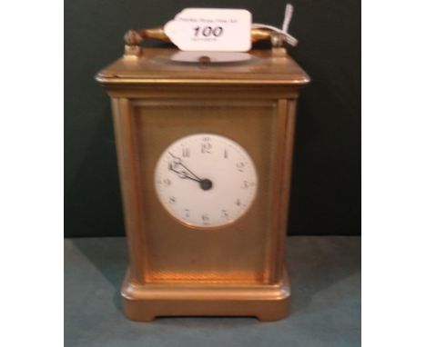 A late 19th century/early 20th century French gilt brass carriage clock, the twin barrel gong striking repeating movement wit