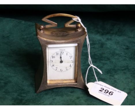 An early 20th century silver cased miniature carriage clock, London hallmarks 1906, the enamel face bearing Arabic numerals t
