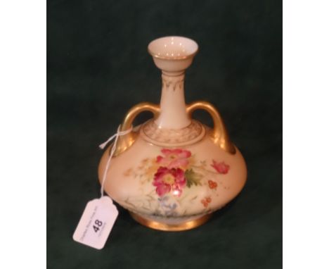 A Royal Worcester blush ivory twin handled vase of conical baluster form, hand painted floral sprays with a gilt finish, shap