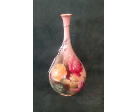 An early 20th century Royal Worcester bottle base, having hand painted floral decoration signed Gladys Farley, circa 1920, pr