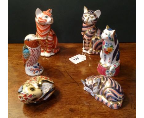 Five Royal Crown Derby paperweights, some with gold stoppers, to include: two seated cats, a woodpecker and others, together 