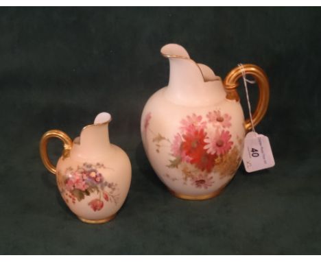 Two Royal Worcester blush ivory jugs, shape numbers 1094 (dated 1897) and another, smaller (dated 1910), each having typical 