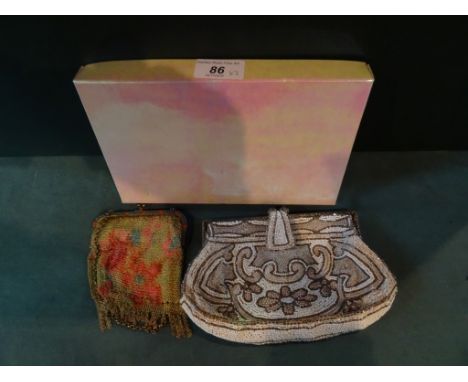 A circa 1930's Art Deco chain link purse, having brass and enamel mounts with a silk lined interior, together with an Art Dec