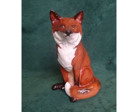 A large Beswick ceramic fireside fox, gloss finish, no. 2348 (31cm). Condition Report: No damage and no signs of any repairs 