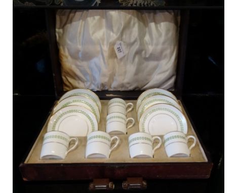 A cased Adderley china part coffee service, comprising: six coffee cans & saucers, early 20th century.