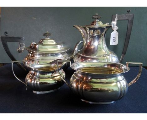 A four piece silver plated tea set, comprising: teapot, hot water pot, twin handled open sugar bowl and cream jug.