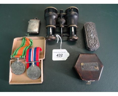 A mixed lot, to include: a WWII Campaign and Defence medal, a silver vesta, a pair of opera glasses, a silver box and a repro