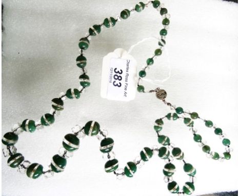 A Chinese silver clasped jade and glass graded bead necklace.