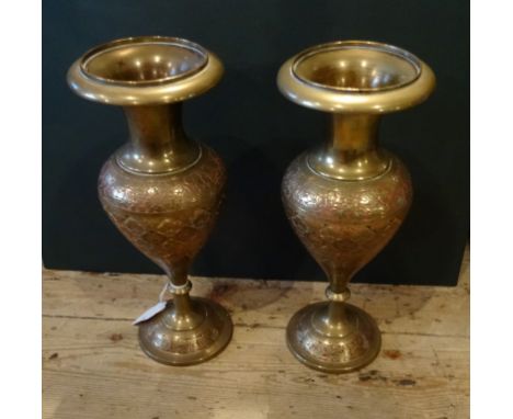 A pair of Indian brass and enamel vases (29cm).