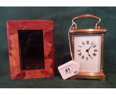 A French gilt brass carriage clock, single barrel movement, five panel bevel edged glass, the enamel dial bearing Roman numer