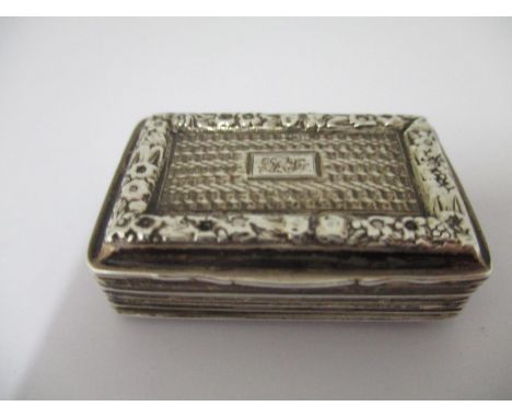 A Victorian silver vinaigrette, by Clark &amp; Smith  Birmingham 1839, of rectangular form with an applied floral border and 
