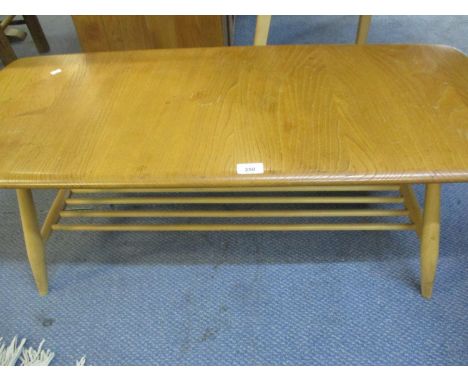 An Ercol light elm coffee table with slatted shelf below on splayed legs 