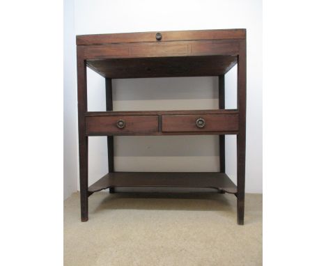 A Regency ebony, string inlaid mahogany side table with hinged top over a shelf with two drawers, on square, tapered legs, un