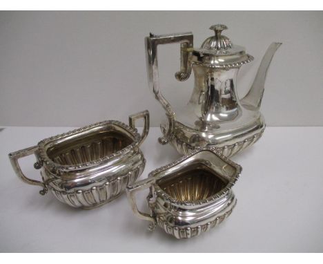 A matched Edward VII silver three piece tea service by Horace Woodward &amp; Co Ltd, teapot, London 1899, sugar bowl and milk