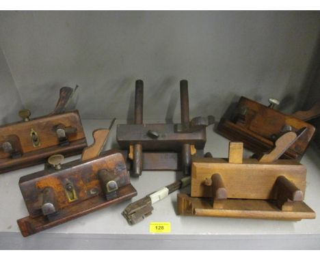 A selection of 19th century wooden woodworking planes to include plow planes, along with a selection of 19th century wooden w