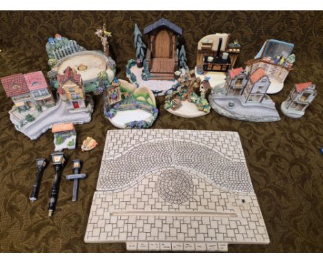 A collection of various Goebel Hummelscapes.
