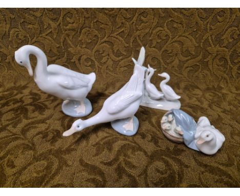 3 Nao geese figures and a Lladro duck and ducklings, all undamaged.