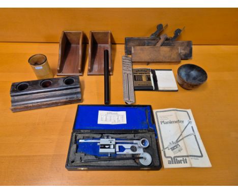 Various woodenware including moulding planes, inkwells, treen bowl, desk items, Troy balance scale, Planimeter.