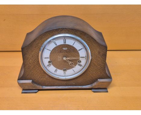 Enfield Clock Co. oak cased chiming mantle clock.