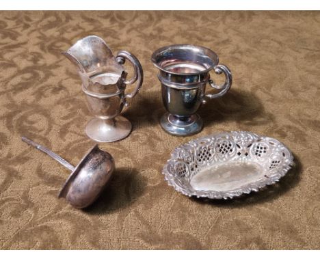 4 pieces of Victorian and later silver. Pierced Greenman dish, unmarked toddy ladle and 2 cream jugs. 215g in total.