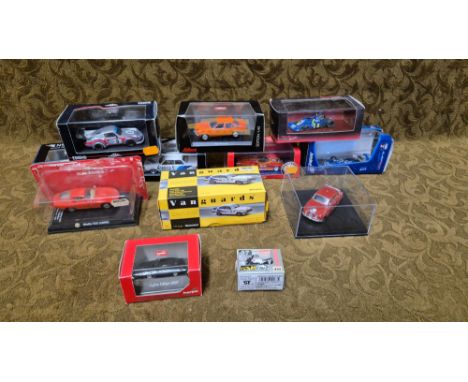 Various boxed 1:43 die cast cars including TrueScale, Schuco, Neo, Ebbro scales models.