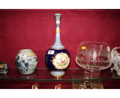 A Royal Worcester vase with painted panels of exotic birds 