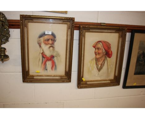 A pair of gilt framed coloured portrait prints of an elderly gentleman and lady