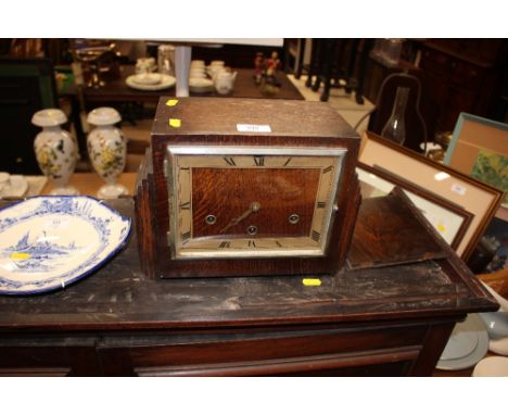 An oak cased Westminster chime mantel clock 