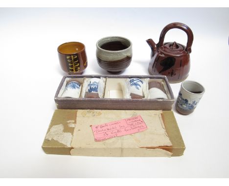 A collection of ceramics including small Japanese style teapot, impressed mark, two yunomi, plus a boxed set of five yunomi w