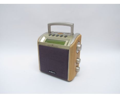 A Roberts RD8 portable radio/cd player, mains or battery operated. Collectors Electrical Item, Please See Information Pages. 