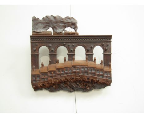 NED HEYWOOD (XX) A ceramic wall plaque, steam train over a viaduct with terrace houses below. Unmarked. 27cm x 27cm