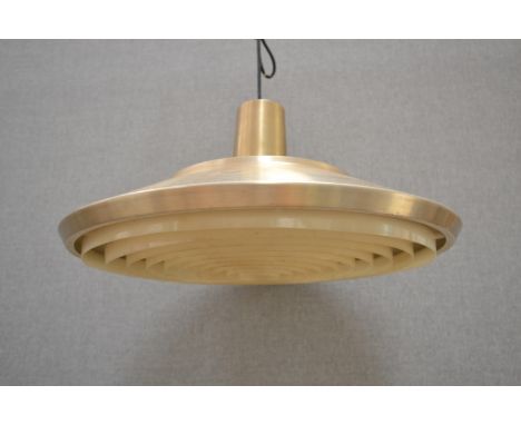 A Danish brassed ceiling light with twin banded diffusers 