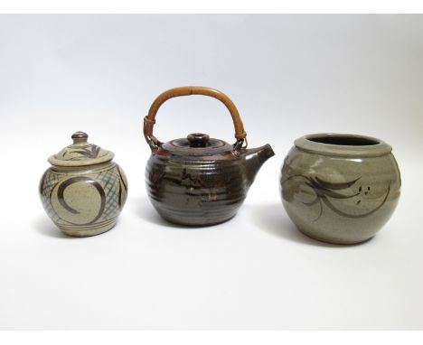 Three pieces of studio pottery including Chris Lewis South Heighton Pottery lidded canister, an unmarked vase and a cane hand