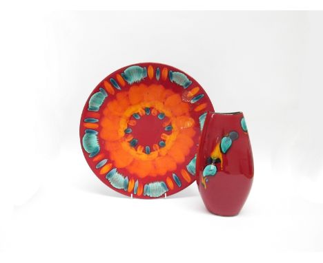 A Poole Pottery Volcano range charger, 40.5cm diameter, together with an Odyssey range vase, 25cm high.  (2)