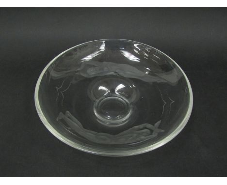 A Large Scandinavian etched clear glass bowl, possibly by Vicke Lindstrand, with male and female swimmers and waves. Unmarked