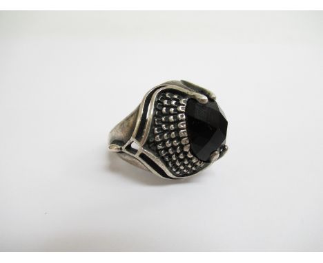 A Mid 20th Century silver ring with black cut stone. Stamped 925 and Olga ? Size R