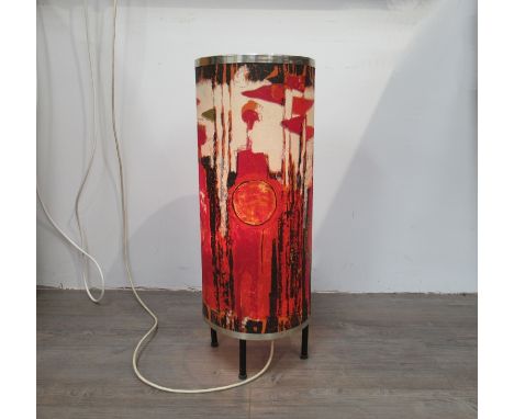 A 1960's floor lamp with Tibor Reich 'Age of Kings' cylindrical shade in red colourway. 62cm high