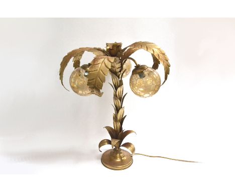 A 1970s brassed metal table lamp as a palm tree with three pale amber glass globe shades 72cm high