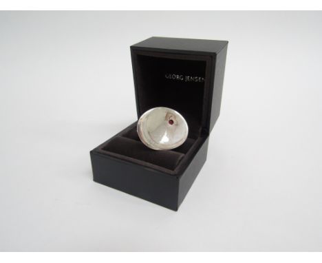 Georg Jensen a women's silver and ruby Mobius Serenity ring in original box. Size I 