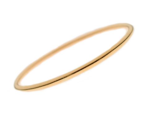 Eastern high carat yellow metal bangle, unmarked, tests as approx 20ct gold, shank width approx 3.3mm, overall diameter 644mm