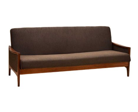 G-Plan teak framed sofa bed, circa 1965, the rectangular upholstered back over teak shaped arms and upholstered panel sides d