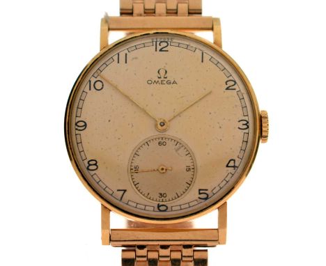Omega - Gentleman's vintage 18ct gold cased bracelet watch, the champagne dial with black Arabic hour markers, seconds subsid