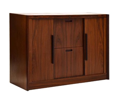 Santos rosewood veneer drawer cabinet, circa 1975 probably Danish, the rectangular top over two tambour front sliding doors o
