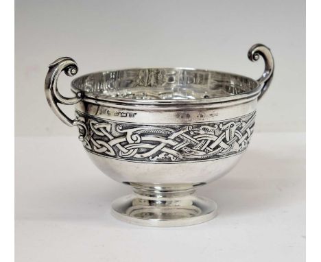 George V two-handled silver bowl having a Celtic design wide band on a circular foot, sponsor's mark of Williams Ltd, Birming