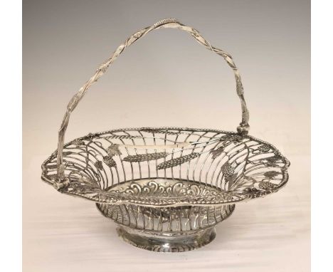 George III silver fruit or bread basket of oval form with wire-work sides applied with trailing grapevines, ears of corn and 